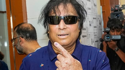 Veteran actor Karthik shows his finger marked with indelible ink after casting his vote for the first phase of Lok Sabha elections, at a polling station in Chennai. (PTI)