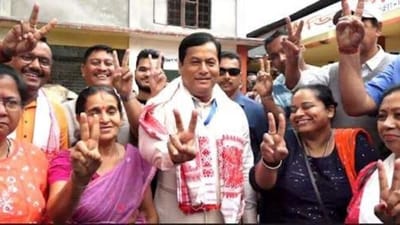 BJP leader Sarbananda Sonowal shows victory sign with other voters after casting his vote at a polling station during the first phase of Lok Sabha elections in Dibrugarh. (PTI) BJP leader Sarbananda Sonowal shows victory sign with other voters after casting his vote at a polling station during the first phase of Lok Sabha elections in Dibrugarh. (PTI)