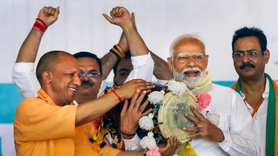 Prime Minister Narendra Modi being felicitated by Uttar Pradesh chief minister Yogi Adityanath during a public meeting for the Lok Sabha elections, at Gajraula in Amroha, (PTI) Prime Minister Narendra Modi being felicitated by Uttar Pradesh chief minister Yogi Adityanath during a public meeting for the Lok Sabha elections, at Gajraula in Amroha, (PTI)