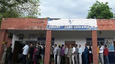 People stand in a queue to cast their votes at a polling station in Udhampur. (AFP) People stand in a queue to cast their votes at a polling station in Udhampur. (AFP)
