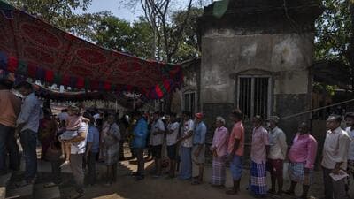 People wait to cast their votes during the first round of polling of India's national election in Chennai on Friday. (AP) People wait to cast their votes during the first round of polling of India's national election in Chennai on Friday. (AP)
