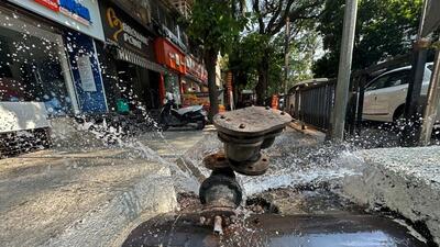 Thane, India - May 09, 2023: Water being wasted due to a water pipeline valve leakage, at Panchpakhadi, near TMC Office, in Thane, India, on Tuesday, May 09, 2023. (Praful Gangurde/HT Photo) (HT PHOTO) Thane, India - May 09, 2023: Water being wasted due to a water pipeline valve leakage, at Panchpakhadi, near TMC Office, in Thane, India, on Tuesday, May 09, 2023. (Praful Gangurde/HT Photo) (HT PHOTO)