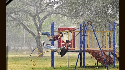 Youngsters making the most of showers at a park in Chandigarh on Friday. Apart from 13.5 mm rain, hail, with 0.8 cm diameter, was also recorded at the Sector 39 IMD observatory. (Ravi Kumar/HT) Youngsters making the most of showers at a park in Chandigarh on Friday. Apart from 13.5 mm rain, hail, with 0.8 cm diameter, was also recorded at the Sector 39 IMD observatory. (Ravi Kumar/HT)