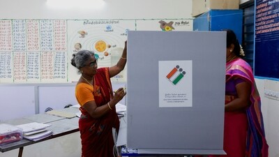 Polling officials work to set up a polling station at a school, a day ahead of the first phase of the election, at Tiruvannamalai in Tamil Nadu on April 18. (Reuters)