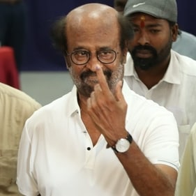 Rajinikanth displays the election ink on his finger
