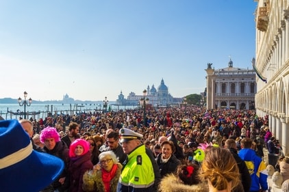 To deal with the burgeoning tourist crowd, Venice will limit the number of people in tourist groups and impose a €5 tax for day trippers (Shutterstock)