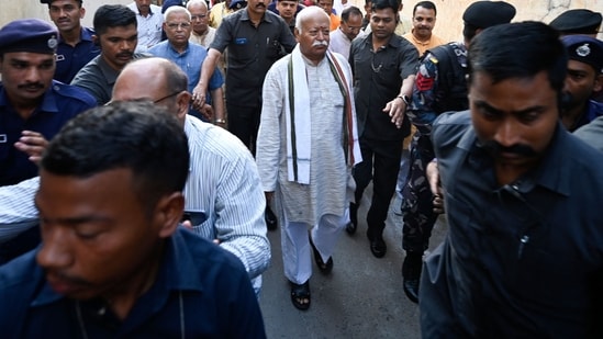Chief of the Rashtriya Swayamsevak Sangh (RSS) Mohan Bhagwat arrives to cast his ballot at a polling station in the first phase of voting for the India's general election, in Nagpur, Maharashtra.(AFP)