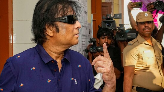 Veteran actor Karthik shows his finger marked with indelible ink after casting his vote for the first phase of Lok Sabha elections, at a polling station in Chennai.(PTI)