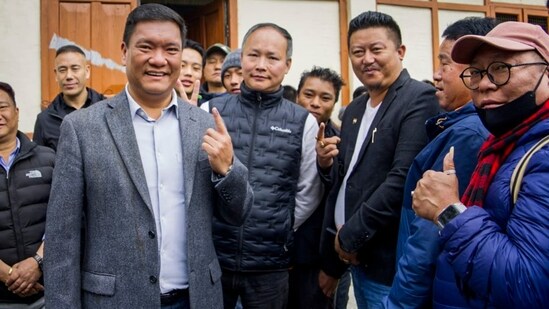 Arunachal Pradesh Chief Minister Pema Khandu shows his finger marked with indelible ink after casting his vote for the first phase of Lok Sabha elections, in Tawang district.(PTI)