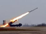 In this photo provided Saturday by the North Korean government, a missile that the state media call "Hwasal-1 Ra-3 strategic cruise missile", is launched from transporter erector launcher vehicle in North Korea