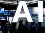 FILE PHOTO: An AI (Artificial Intelligence) sign is seen at the World Artificial Intelligence Conference (WAIC) in Shanghai, China July 6, 2023. REUTERS/Aly Song/File Photo