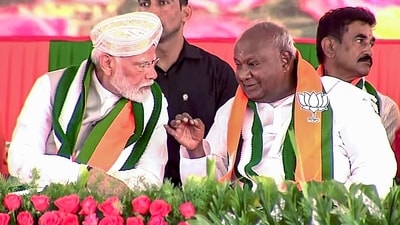 PM Narendra Modi in a conversation with former prime minister and JD(S) leader H. D. Devegowda during a public rally in Chikkaballapur on Saturday. (ANI) PM Narendra Modi in a conversation with former prime minister and JD(S) leader H. D. Devegowda during a public rally in Chikkaballapur on Saturday. (ANI)