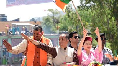 BJP’s Mandi candidate Kangana Ranaut and former CM Jai Ram Thakur during a road show at Chail Chowk. (HT Photo) BJP’s Mandi candidate Kangana Ranaut and former CM Jai Ram Thakur during a road show at Chail Chowk. (HT Photo)
