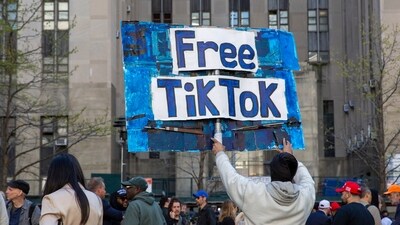 A man carries a Free TikTok sign in front of the courthouse where the hush-money trial of Donald Trump got underway April 15, 2024, in New York. (AP Photo/Ted Shaffrey, File) (AP) A man carries a Free TikTok sign in front of the courthouse where the hush-money trial of Donald Trump got underway April 15, 2024, in New York. (AP Photo/Ted Shaffrey, File) (AP)
