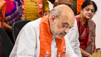 Gandhinagar: Union Home Minister and BJP candidate Amit Shah files his nomination papers for the Lok Sabha elections, in Gandhinagar, Friday, April 19, 2024. (PTI Photo) Gandhinagar: Union Home Minister and BJP candidate Amit Shah files his nomination papers for the Lok Sabha elections, in Gandhinagar, Friday, April 19, 2024. (PTI Photo)
