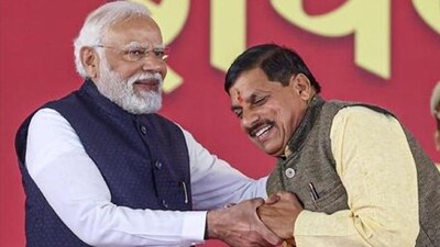 Prime Minister Narendra Modi being greeted by Madhya Pradesh chief minister Mohan Yadav (PTI) Prime Minister Narendra Modi being greeted by Madhya Pradesh chief minister Mohan Yadav (PTI)
