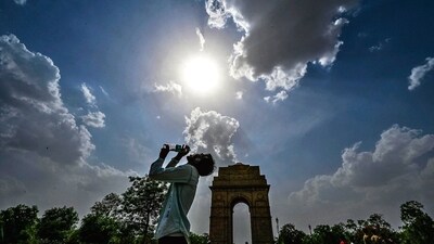 Silhouette of a man drinking water from a bottle during a hot summer day near India Gate in New Delhi on Saturday. (Raj K Raj/ HT Photo) Silhouette of a man drinking water from a bottle during a hot summer day near India Gate in New Delhi on Saturday. (Raj K Raj/ HT Photo)