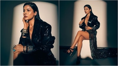 Assisted by hairstylist Aliya Shaik, Shehnaaz straightened her luscious locks and styled them into a back-combed, side-parted hairdo that perfectly complemented her glamorous look. (Instagram/@shehnaazgill) Assisted by hairstylist Aliya Shaik, Shehnaaz straightened her luscious locks and styled them into a back-combed, side-parted hairdo that perfectly complemented her glamorous look. (Instagram/@shehnaazgill)