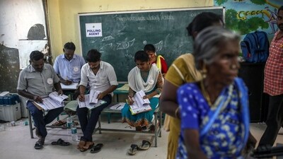 Tamil Nadu Lok Sabha election: Officials at a polling station during the first phase of voting for national elections in Chennai, Tamil Nadu. (Bloomberg) Tamil Nadu Lok Sabha election: Officials at a polling station during the first phase of voting for national elections in Chennai, Tamil Nadu. (Bloomberg)
