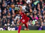 Fulham's Bobby Decordova-Reid, top, duels for the ball with Liverpool's Ryan Gravenberch. Fulham's Bobby Decordova-Reid, top, duels for the ball with Liverpool's Ryan Gravenberch.
