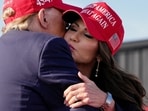 Republican presidential candidate and former President Donald Trump, left, embraces South Dakota Gov. Kristi Noem at a campaign rally in Vandalia, Ohio. (AP Photo/Jeff Dean) Republican presidential candidate and former President Donald Trump, left, embraces South Dakota Gov. Kristi Noem at a campaign rally in Vandalia, Ohio. (AP Photo/Jeff Dean)