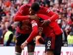 Manchester United's Bruno Fernandes celebrates scoring their third goal with Marcus Rashford 