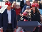 (L-R) Former US President and Republican presidential candidate Donald Trump listens as North Dakota Governor Kristi Noem speaks during a Buckeye Values PAC Rally in Vandalia, Ohio, on March 16, 2024. (Photo by KAMIL KRZACZYNSKI / AFP) (L-R) Former US President and Republican presidential candidate Donald Trump listens as North Dakota Governor Kristi Noem speaks during a Buckeye Values PAC Rally in Vandalia, Ohio, on March 16, 2024. (Photo by KAMIL KRZACZYNSKI / AFP)