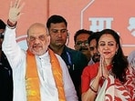 Union home minister Amit Shah and RLD chief Jayant Chaudhary at an election campaign rally in support of BJP’s Mathura candidate Hema Malini at Vrindavan on Saturday (PTI PHOTO) Union home minister Amit Shah and RLD chief Jayant Chaudhary at an election campaign rally in support of BJP’s Mathura candidate Hema Malini at Vrindavan on Saturday (PTI PHOTO)