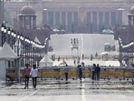 Visitors brave the heat wave in the city on Sunday afternoon at Kartavaya Path in New Delhi. Visitors brave the heat wave in the city on Sunday afternoon at Kartavaya Path in New Delhi.