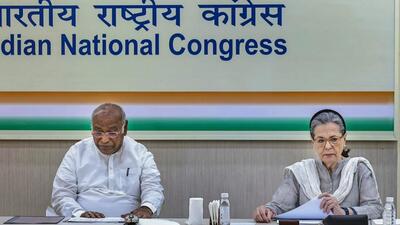 Congress president Mallikarjun Kharge with former chief Sonia Gandhi during the party's Central Election Committee meeting in Delhi on Sunday. (PTI)