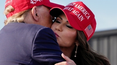 Republican presidential candidate and former President Donald Trump, left, embraces South Dakota Gov. Kristi Noem at a campaign rally in Vandalia, Ohio. (AP Photo/Jeff Dean) (AP) Republican presidential candidate and former President Donald Trump, left, embraces South Dakota Gov. Kristi Noem at a campaign rally in Vandalia, Ohio. (AP Photo/Jeff Dean) (AP)
