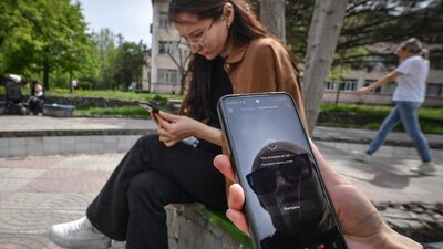 A girl shows a mobile phone where Tik Tok reports problems to be accessed, in Bishkek on April 19, 2024. The ban in Kyrgyzstan -- a small, ex-Soviet country of seven million people -- is just one small part of a global backlash from politicians and regulators to the app's surging popularity. Owned by Chinese group ByteDance, TikTok is embroiled in a string of battles over issues ranging from the mental health effects of the app to the data it allegedly scoops up from users. (Photo by Vyacheslav OSELEDKO / AFP) (AFP) A girl shows a mobile phone where Tik Tok reports problems to be accessed, in Bishkek on April 19, 2024. The ban in Kyrgyzstan -- a small, ex-Soviet country of seven million people -- is just one small part of a global backlash from politicians and regulators to the app's surging popularity. Owned by Chinese group ByteDance, TikTok is embroiled in a string of battles over issues ranging from the mental health effects of the app to the data it allegedly scoops up from users. (Photo by Vyacheslav OSELEDKO / AFP) (AFP)