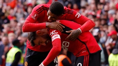 Manchester United's Bruno Fernandes celebrates scoring their third goal with Marcus Rashford (Action Images via Reuters)