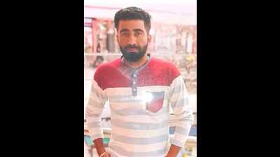 The deceased, identified as Tajinder Sharma alias Teji, 35, originally a native of Hathan village, Malerkotla, was residing in Kharar. (HT photo) The deceased, identified as Tajinder Sharma alias Teji, 35, originally a native of Hathan village, Malerkotla, was residing in Kharar. (HT photo)