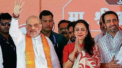Union home minister Amit Shah and RLD chief Jayant Chaudhary at an election campaign rally in support of BJP’s Mathura candidate Hema Malini at Vrindavan on Saturday (PTI PHOTO) Union home minister Amit Shah and RLD chief Jayant Chaudhary at an election campaign rally in support of BJP’s Mathura candidate Hema Malini at Vrindavan on Saturday (PTI PHOTO)