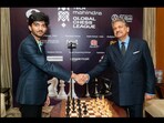 Snapshot of Gukesh D with Anand Mahindra. Snapshot of Gukesh D with Anand Mahindra.