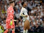 Real Madrid's English midfielder ude Bellingham (R) reacts during the match against Barcelona. Real Madrid's English midfielder ude Bellingham (R) reacts during the match against Barcelona.