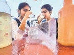 Girls cooling off in Thane as mercury dipped by five degrees Celsius after two days of scorching heat in Mumbai area (Praful Gangurde/HT Photo) Girls cooling off in Thane as mercury dipped by five degrees Celsius after two days of scorching heat in Mumbai area (Praful Gangurde/HT Photo)