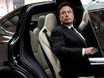 Tesla Chief Executive Officer Elon Musk gets in a Tesla car as he leaves a hotel in Beijing, China.