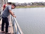 Surat: Senior police officer Daya Nayak, known as �encounter specialist�, with his team during search of a revolver thrown by Bishnoi Brothers in the River Tapi after they allegedly opened fire at actor Salman Khan's residence, in Surat, Monday, April 22, 2024. (PTI Photo) (PTI04_22_2024_000108A) Surat: Senior police officer Daya Nayak, known as �encounter specialist�, with his team during search of a revolver thrown by Bishnoi Brothers in the River Tapi after they allegedly opened fire at actor Salman Khan's residence, in Surat, Monday, April 22, 2024. (PTI Photo) (PTI04_22_2024_000108A)