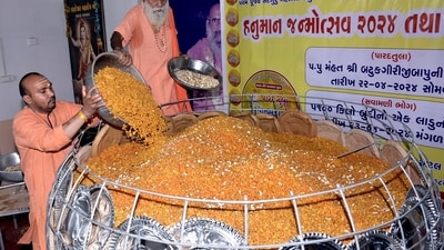 Distribution of Prasad: Prasad, a sacred offering blessed by the deity, is distributed among devotees as a symbol of divine grace and blessings. (ANI) Distribution of Prasad: Prasad, a sacred offering blessed by the deity, is distributed among devotees as a symbol of divine grace and blessings. (ANI)