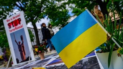 A Ukrainian flag flies at a makeshift memorial in front of the Russian embassy in Berlin dedicated to Ukrainian victims of the Russia-Ukraine conflict, on April 21, 2024. The US House of Representatives approved on April 20, 2024 long-delayed military aid to Ukraine in a rare show of bipartisan unity, while also bolstering Israel and Taiwan defenses and threatening to ban Chinese-owned TikTok. (Photo by John MACDOUGALL / AFP) (AFP) A Ukrainian flag flies at a makeshift memorial in front of the Russian embassy in Berlin dedicated to Ukrainian victims of the Russia-Ukraine conflict, on April 21, 2024. The US House of Representatives approved on April 20, 2024 long-delayed military aid to Ukraine in a rare show of bipartisan unity, while also bolstering Israel and Taiwan defenses and threatening to ban Chinese-owned TikTok. (Photo by John MACDOUGALL / AFP) (AFP)