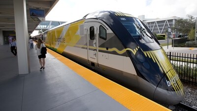 A Brightline train is shown at a station in Fort Lauderdale, Florida. A fast-tracked plan to build a high-speed passenger rail line between Las Vegas and the Los Angeles area is set to mark the start of construction. Brightline West and US transportation secretary and other officials projecting that millions of ticket-buyers will be boarding trains by 2028. (AP Photo/Wilfredo Lee, File) A Brightline train is shown at a station in Fort Lauderdale, Florida. A fast-tracked plan to build a high-speed passenger rail line between Las Vegas and the Los Angeles area is set to mark the start of construction. Brightline West and US transportation secretary and other officials projecting that millions of ticket-buyers will be boarding trains by 2028. (AP Photo/Wilfredo Lee, File)