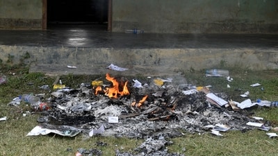 Belongings of a polling booth are seen after being set afire by a crowd during the first phase of the general election, in Moirangkampu in Imphal East, Manipur. (REUTERS)