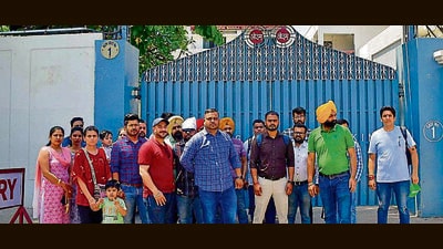 Parents protest outside BCM Arya Model School, Shastri Nagar, Ludhiana on Monday. (Manish/HT) Parents protest outside BCM Arya Model School, Shastri Nagar, Ludhiana on Monday. (Manish/HT)