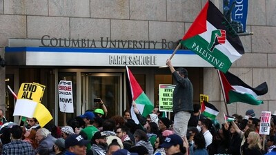 Pro-Palestinian activists protest outside Columbia University in New York City on April 20, 2024. (Photo by Leonardo Munoz / AFP) (AFP) Pro-Palestinian activists protest outside Columbia University in New York City on April 20, 2024. (Photo by Leonardo Munoz / AFP) (AFP)