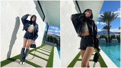 Lisa shared the photos with the caption, "Good to be back in Coachella." While the black cropped leather jacket she wore features a raised neckline, metal button closures, an open front, an oversized silhouette, full-length sleeves, and a cinched hem, the cut-out black shorts have a high-rise waistline, side pockets, frayed hem, and a bodycon silhouette. (Instagram) Lisa shared the photos with the caption, "Good to be back in Coachella." While the black cropped leather jacket she wore features a raised neckline, metal button closures, an open front, an oversized silhouette, full-length sleeves, and a cinched hem, the cut-out black shorts have a high-rise waistline, side pockets, frayed hem, and a bodycon silhouette. (Instagram)