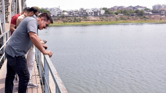 Surat: Senior police officer Daya Nayak, known as �encounter specialist�, with his team during search of a revolver thrown by Bishnoi Brothers in the River Tapi after they allegedly opened fire at actor Salman Khan's residence, in Surat, Monday, April 22, 2024. (PTI Photo) (PTI04_22_2024_000108A) (PTI)
