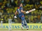 Marcus Stoinis celebrates after scoring the winning runs in the Indian Premier League cricket match between Chennai Super Kings and Lucknow Super Giants.