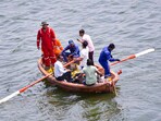 A team of police officials led by senior police officer Daya Nayak during search for a revolver thrown by Bishnoi brothers in the River Tapi after they allegedly opened fire at actor Salman Khan's residence A team of police officials led by senior police officer Daya Nayak during search for a revolver thrown by Bishnoi brothers in the River Tapi after they allegedly opened fire at actor Salman Khan's residence